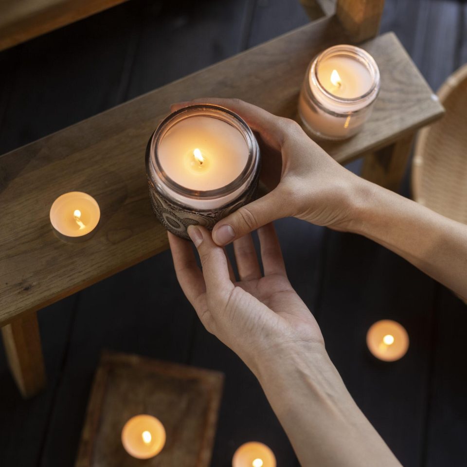 top-view-woman-holding-candle top-view-woman-holding-candle